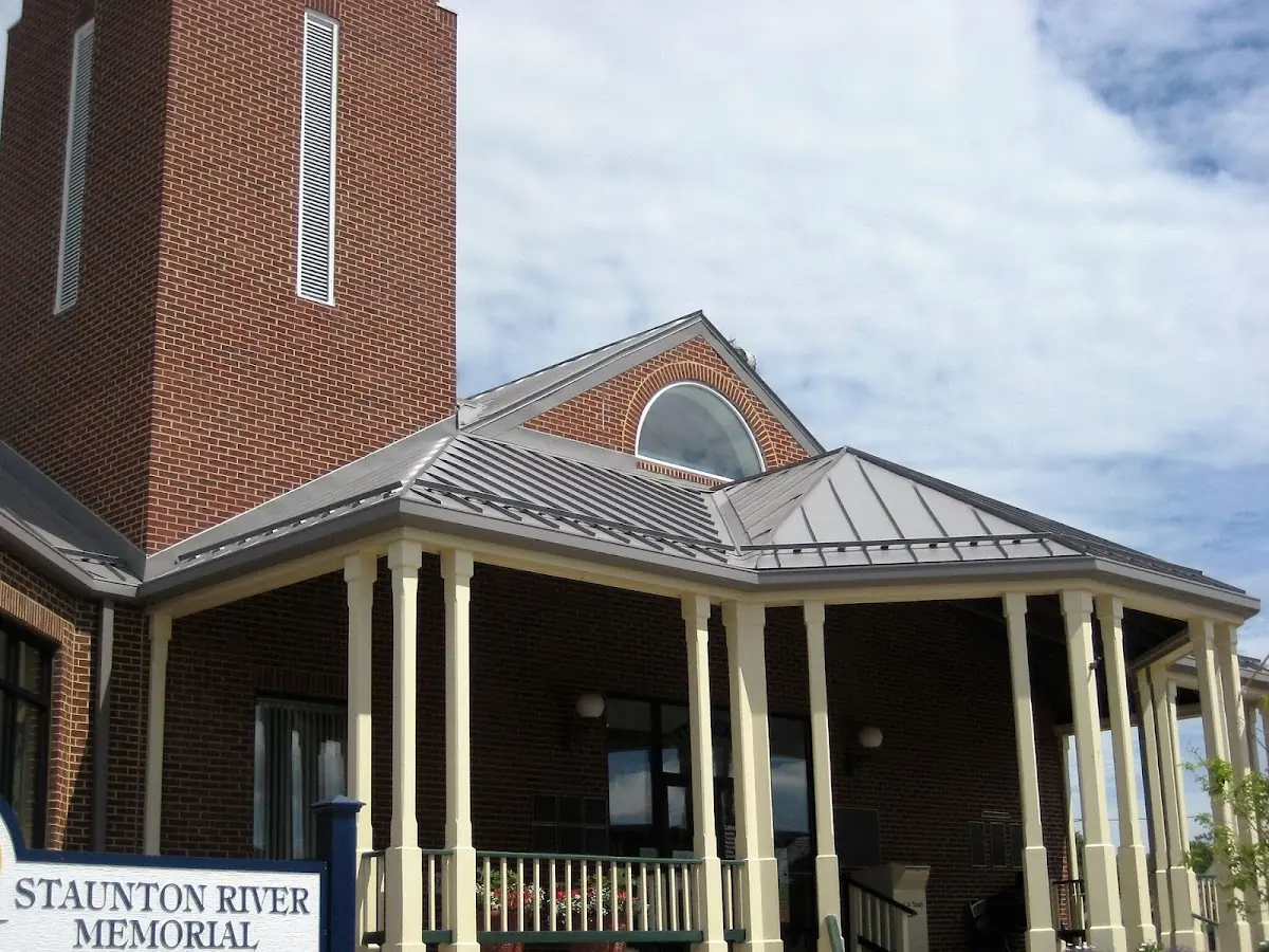 Skilled roofing craftsmen working on a residential roof in Lewistown
